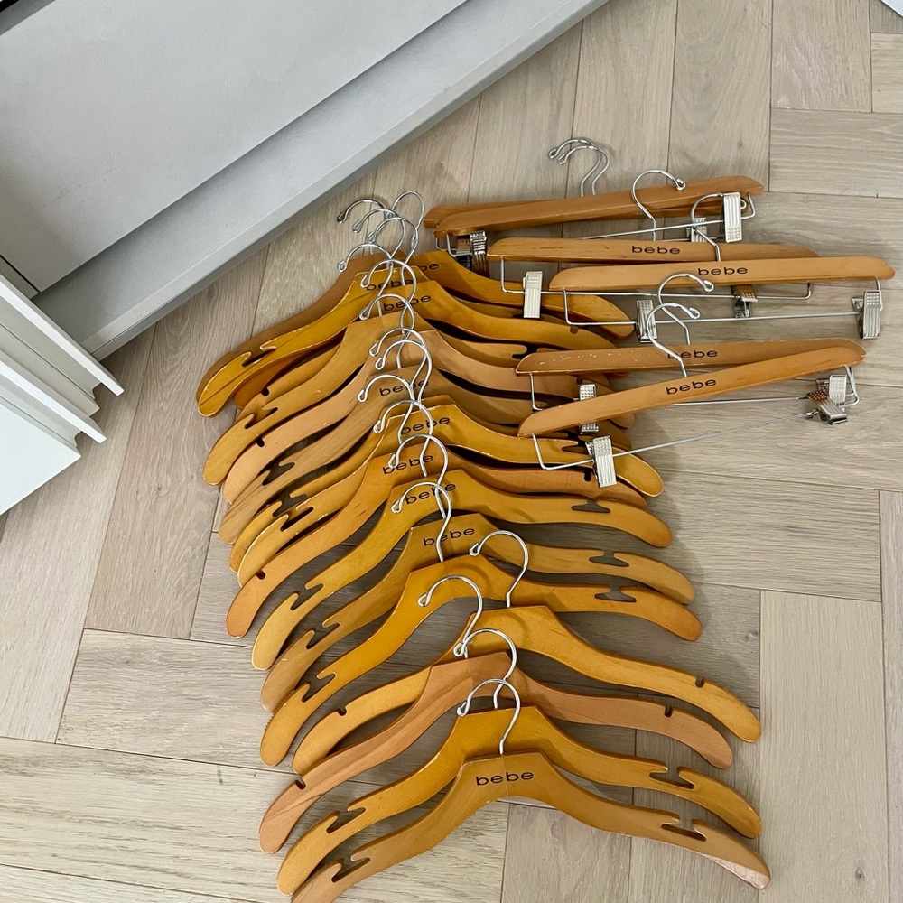 Bebe wooden hangers, 18 jacket hangers and six pants/skirt hangers all for $65
